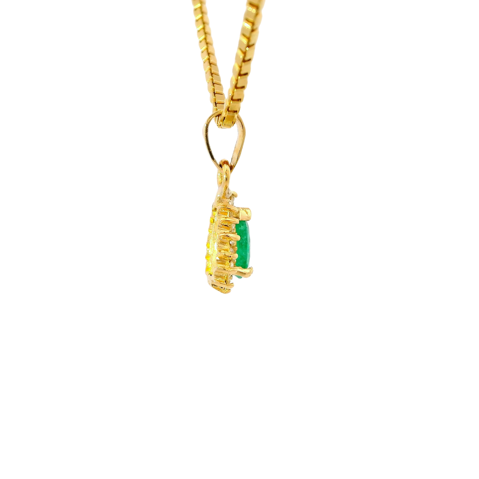 Elegante colgante de esmeralda en oro 18k ley