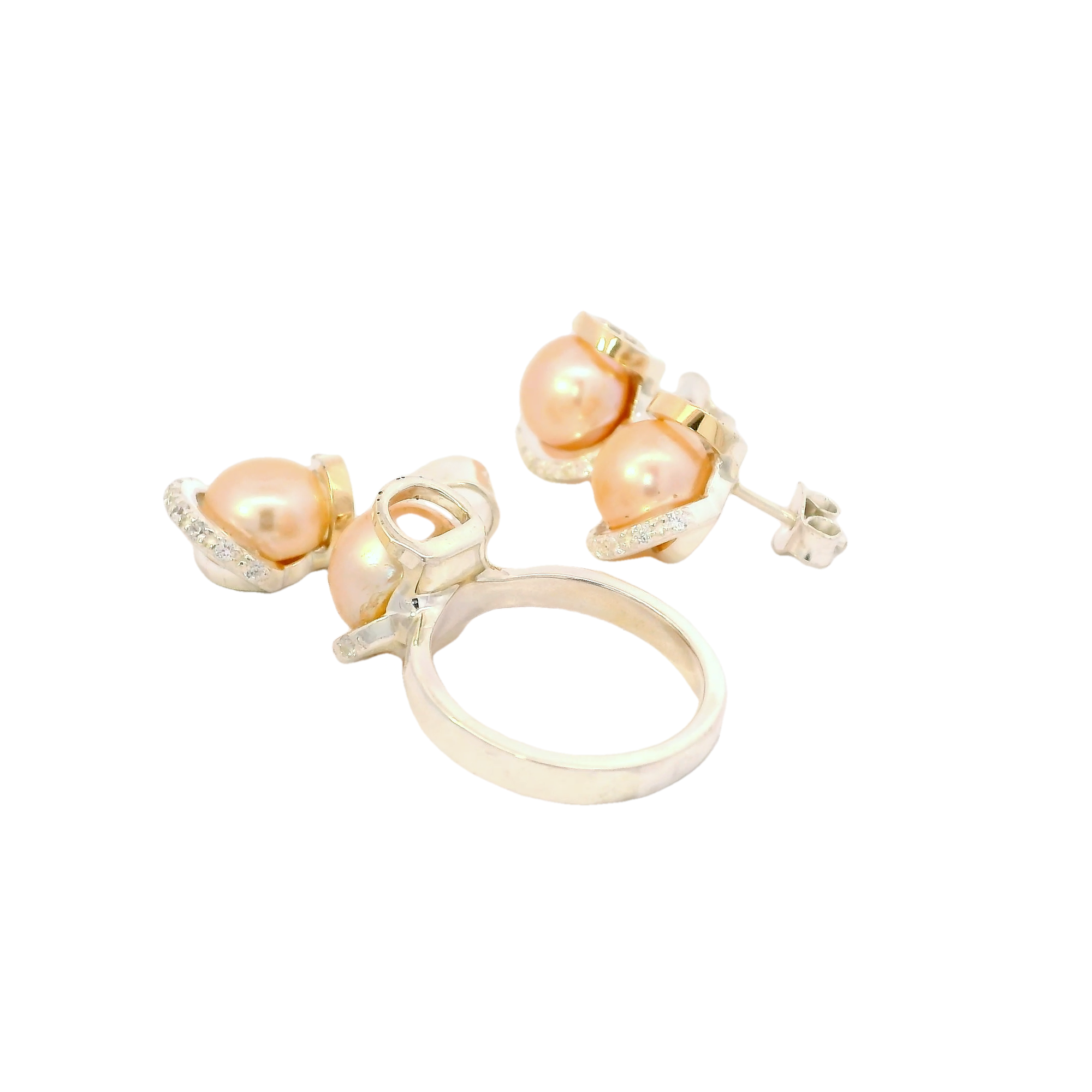 Conjunto de joyas con perlas rosadas en plata con oro