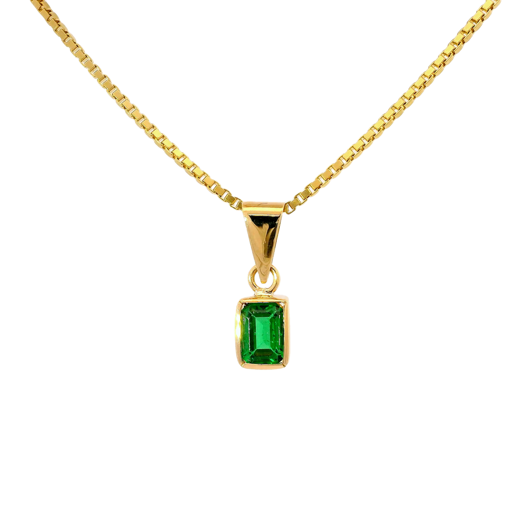 Colgante con esmeralda en oro amarillo 18k ley