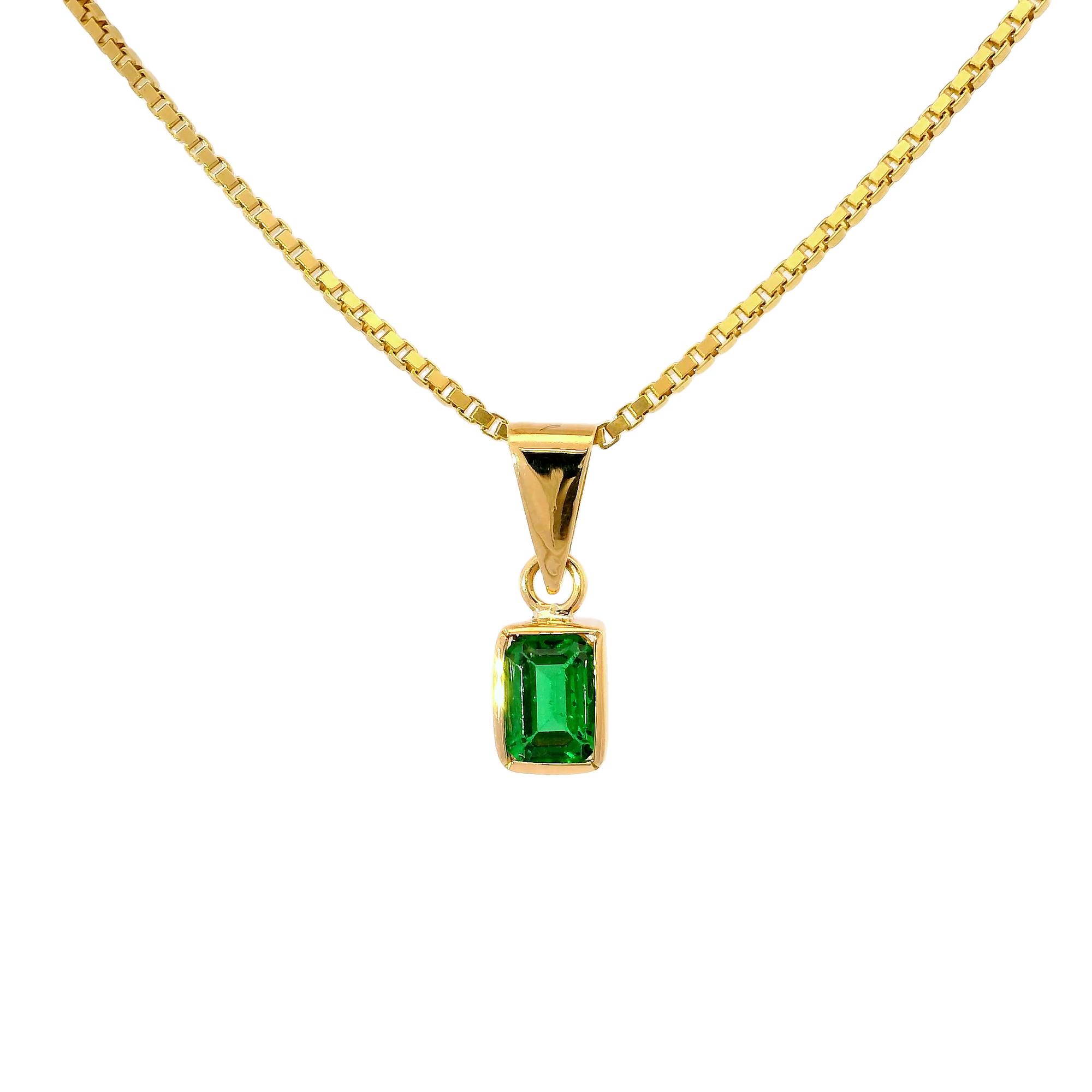 Colgante con esmeralda en oro amarillo 18k ley