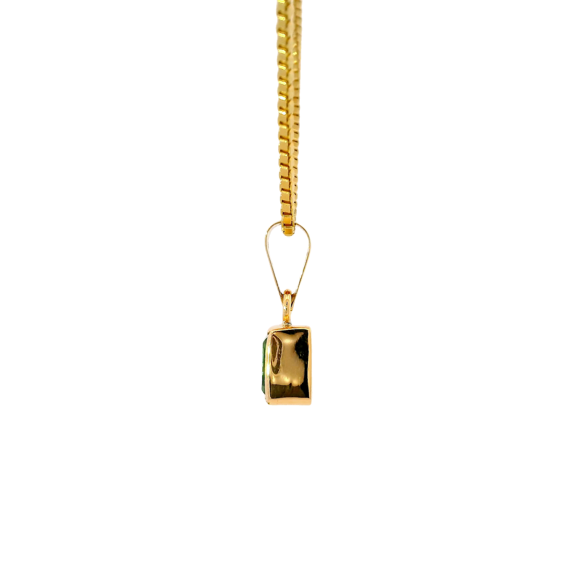 Colgante con esmeralda en oro amarillo 18k ley