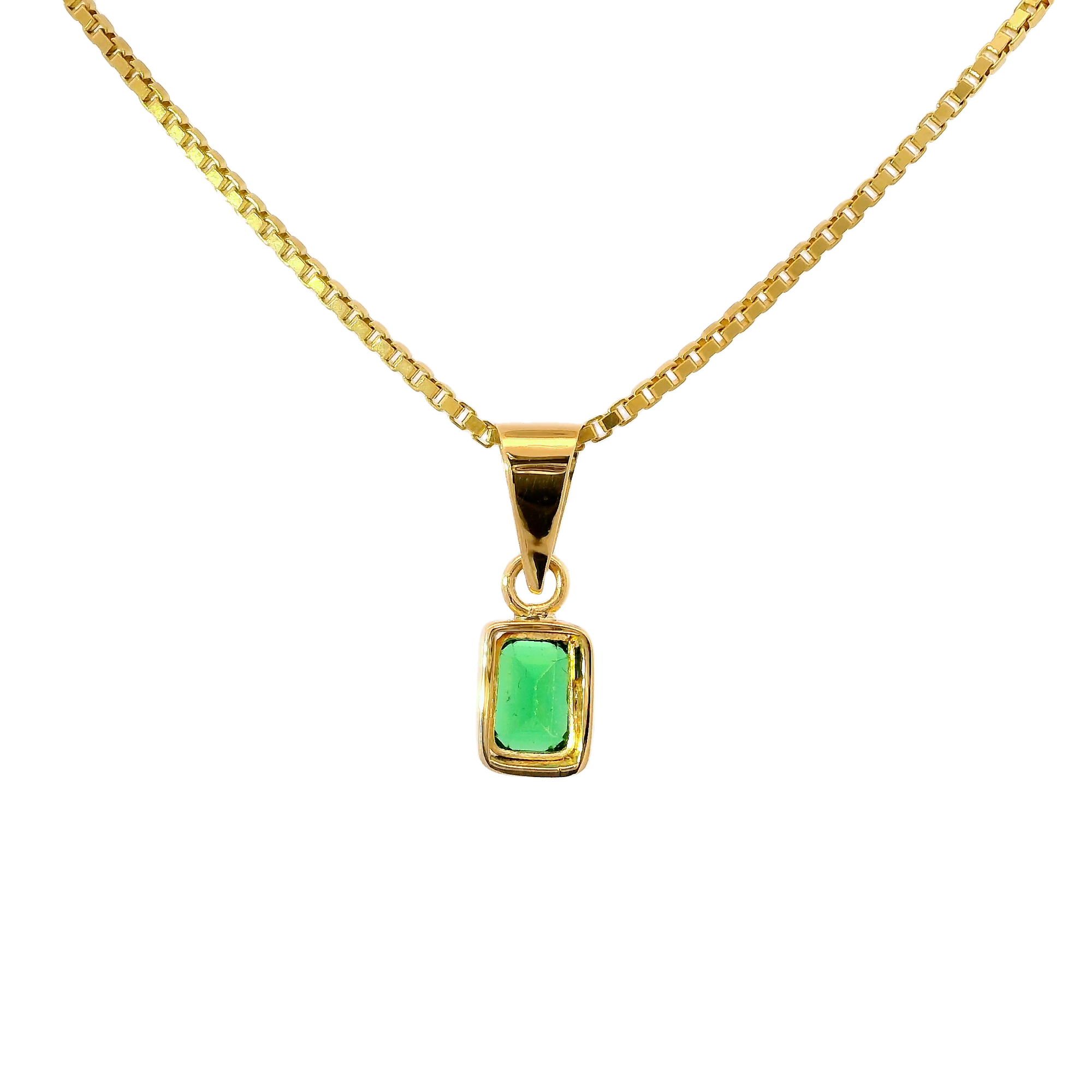 Colgante con esmeralda en oro amarillo 18k ley