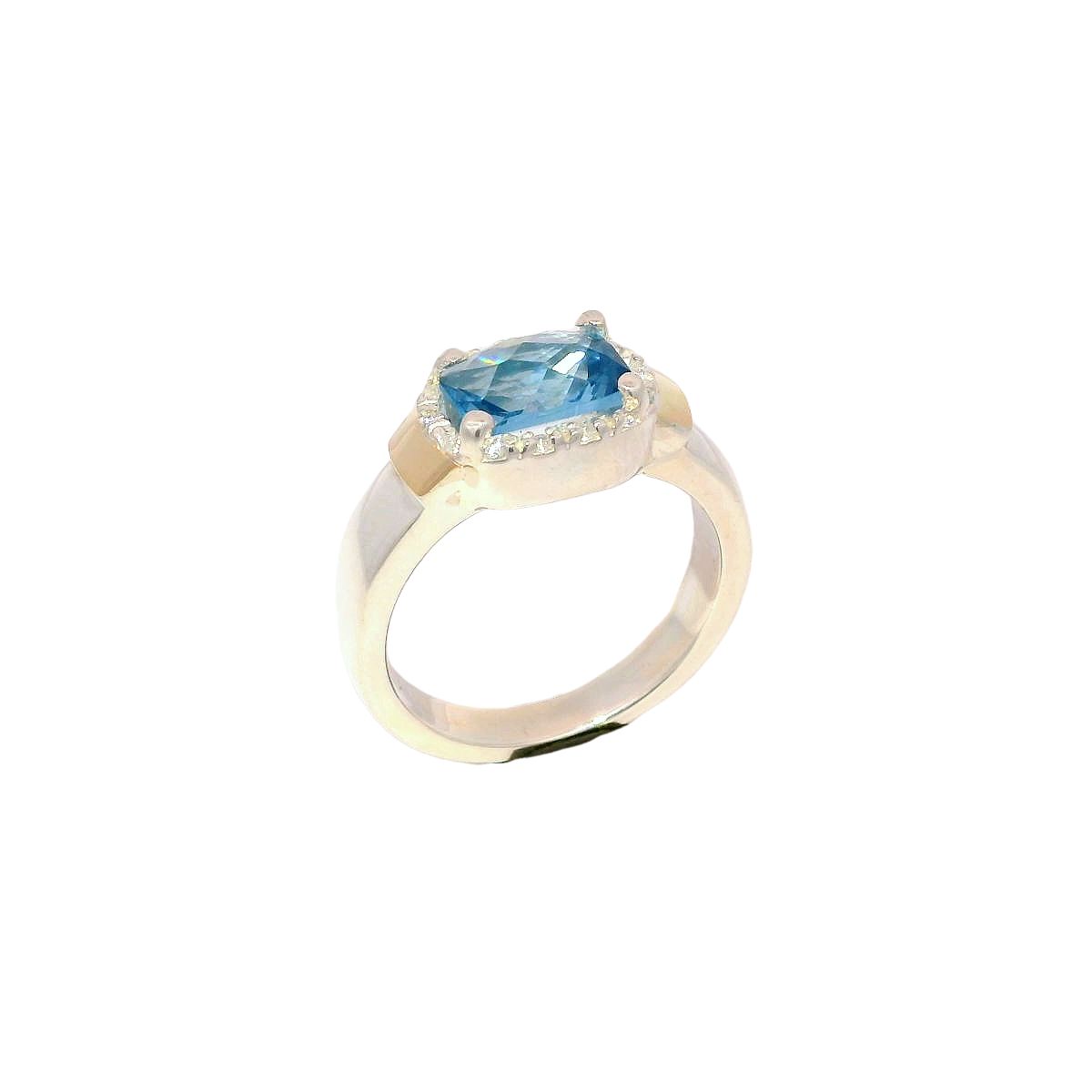 Anillo de zircón agua marina en plata con oro