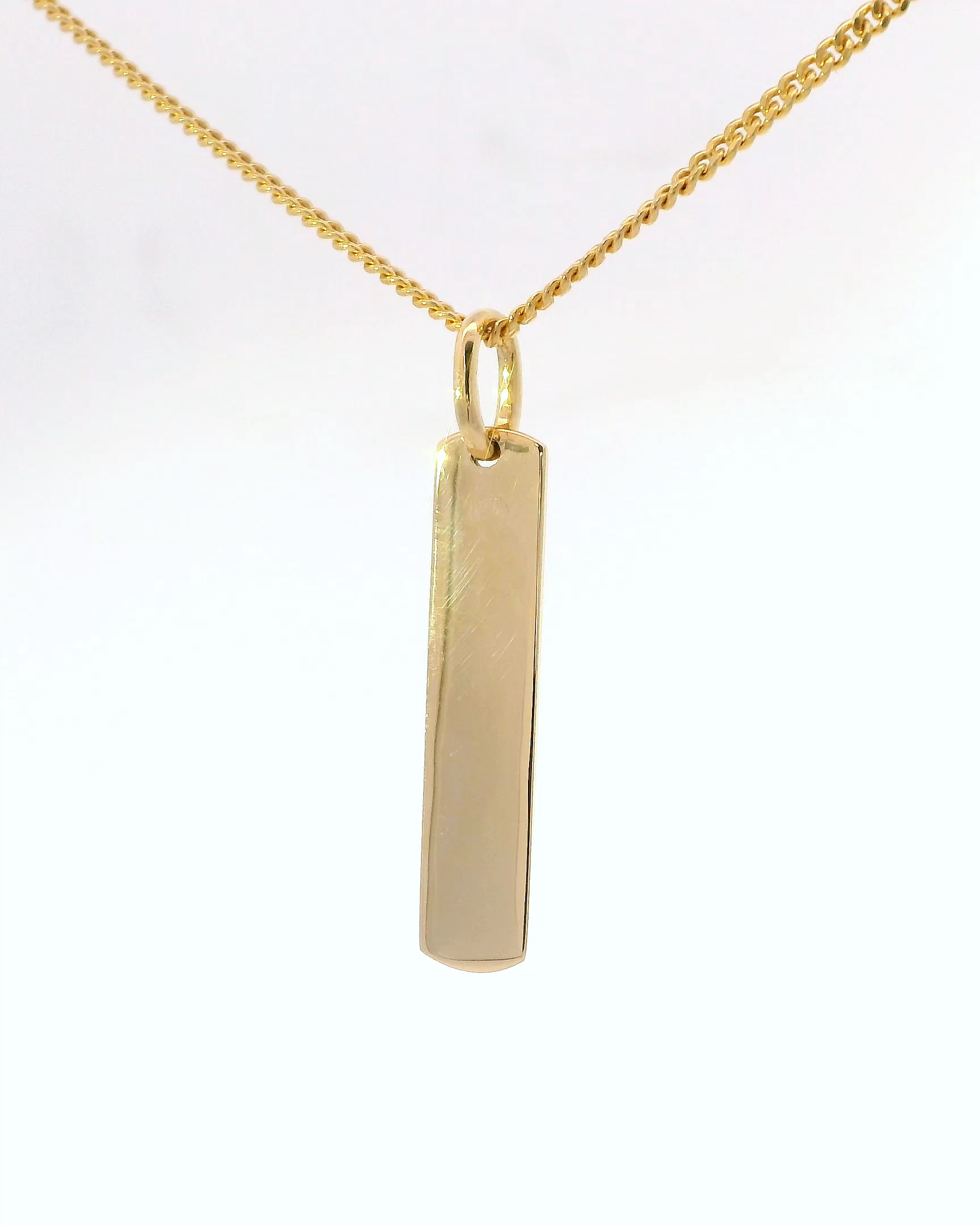 Elegante dije de placa en oro amarillo 18k ley