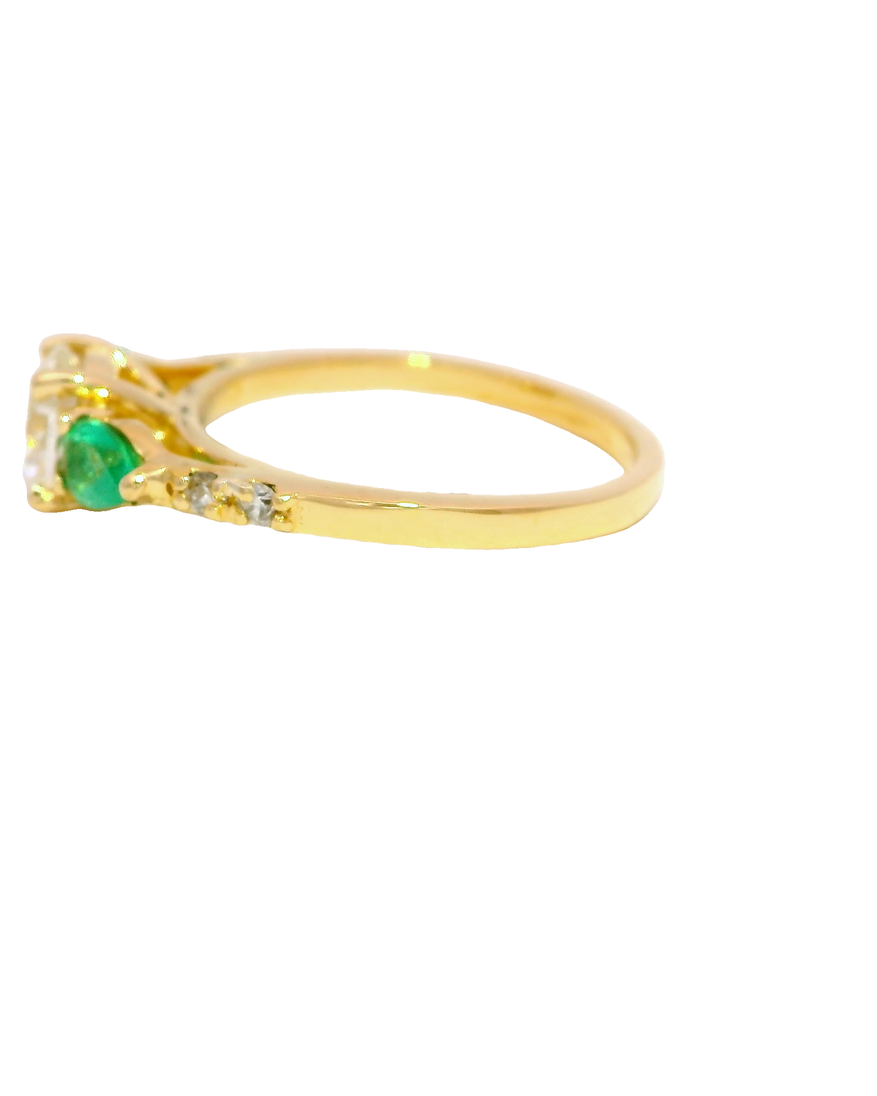 Anillo de compromiso con diamantes y esmeraldas