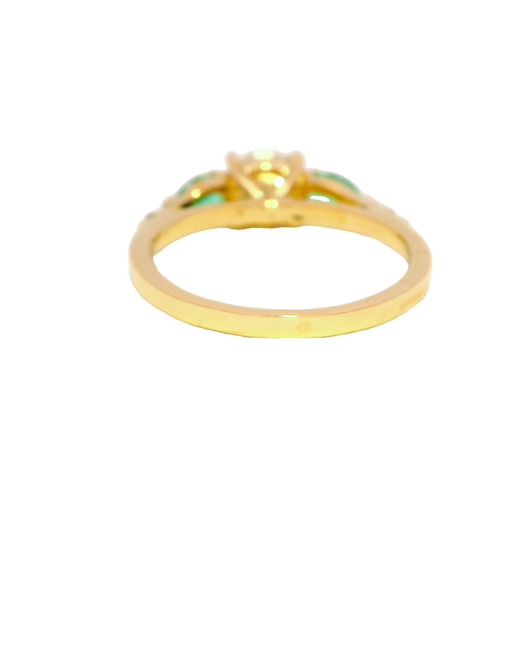 Anillo de compromiso con diamantes y esmeraldas