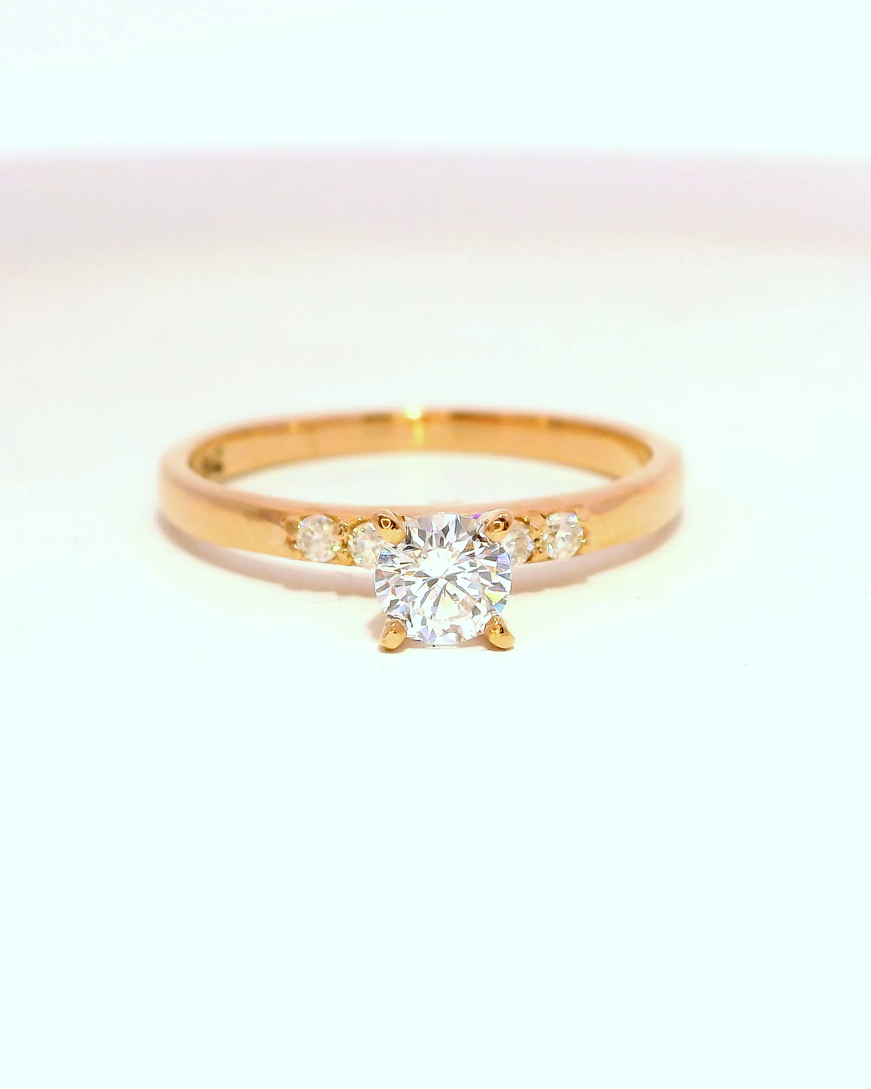 Anillo de compromiso en oro rosa 18k ley con diamante redondo de 0.25 cts
