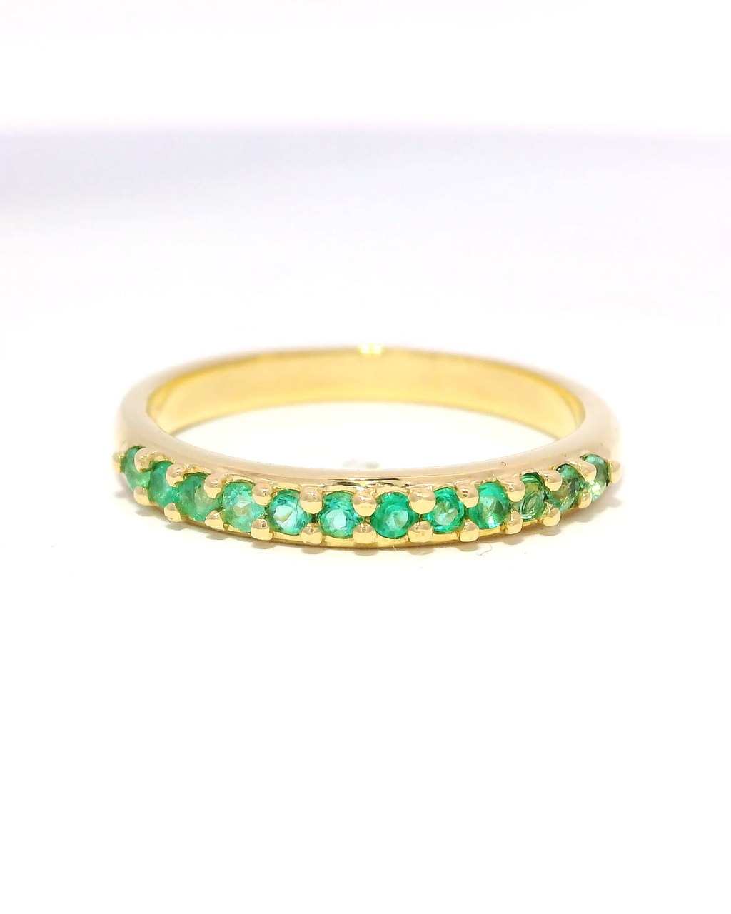 Banda eternidad de esmeraldas y oro amarillo 18k ley