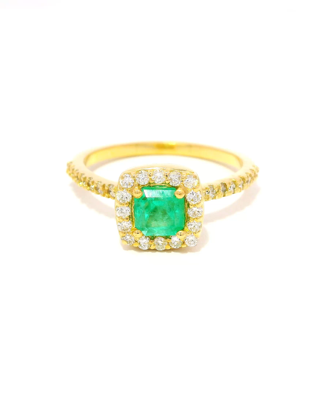 Anillo de oro amarillo 18k Ley con esmeralda de 0.70 cts.