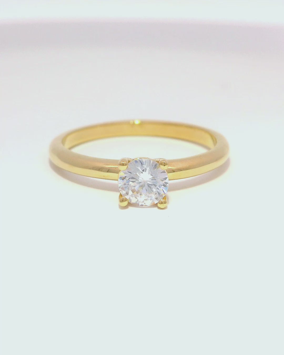 Anillo de compromiso en oro amarillo 18k ley con diamante 0.50cts