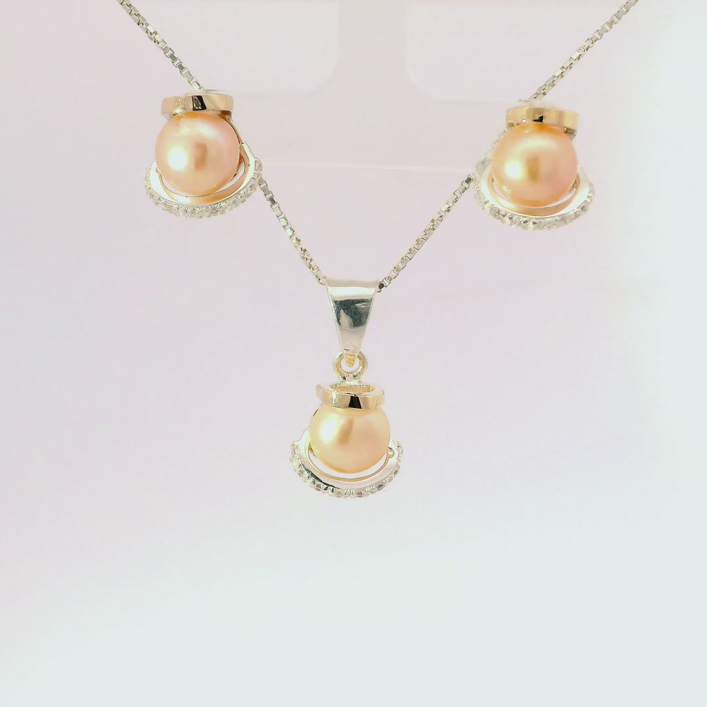 Conjunto de joyería elegante con perlas en plata con oro