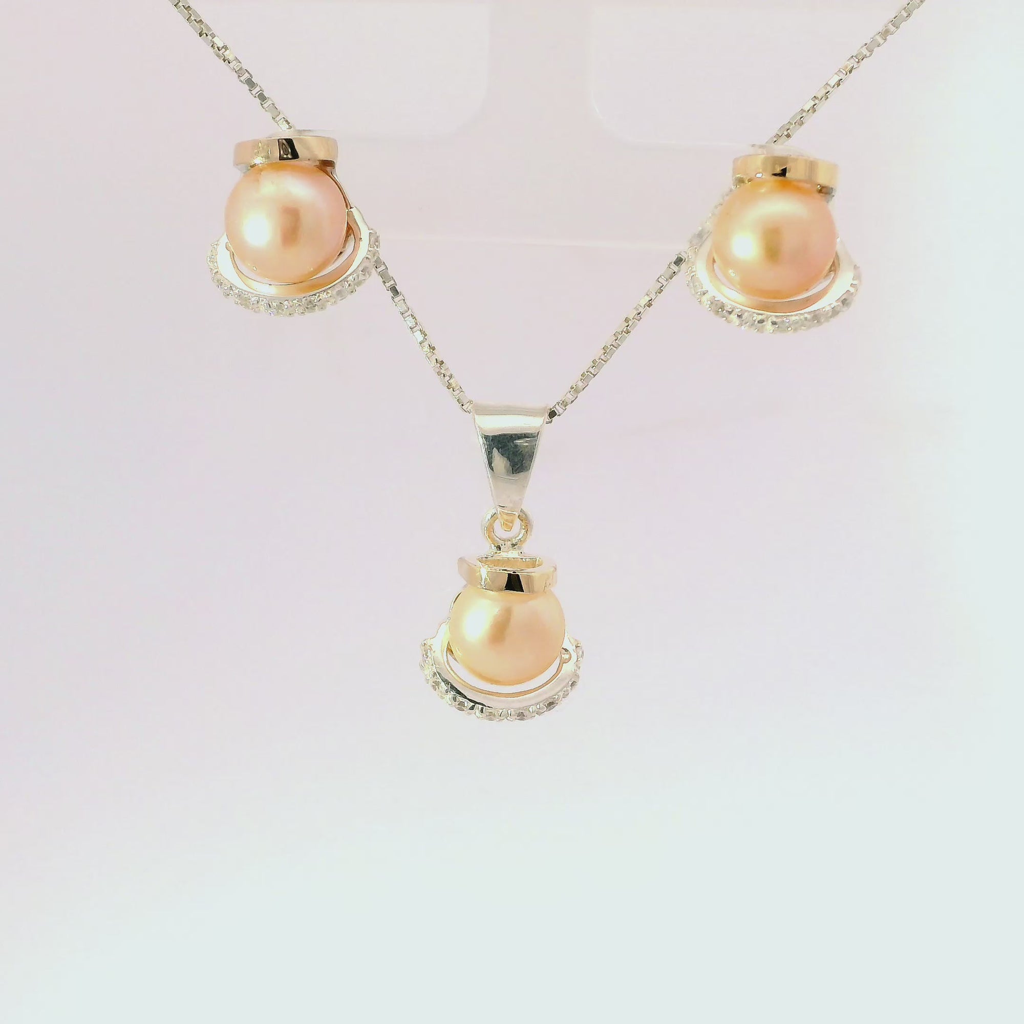 Conjunto de joyería elegante con perlas en plata con oro