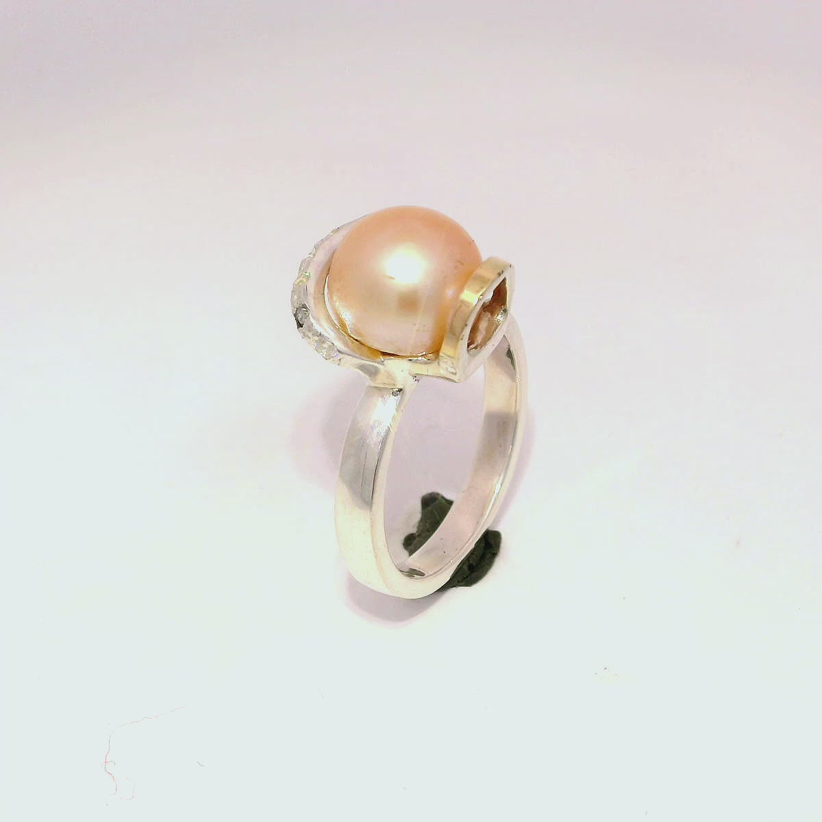 Anillo de perla elegante en plata con oro