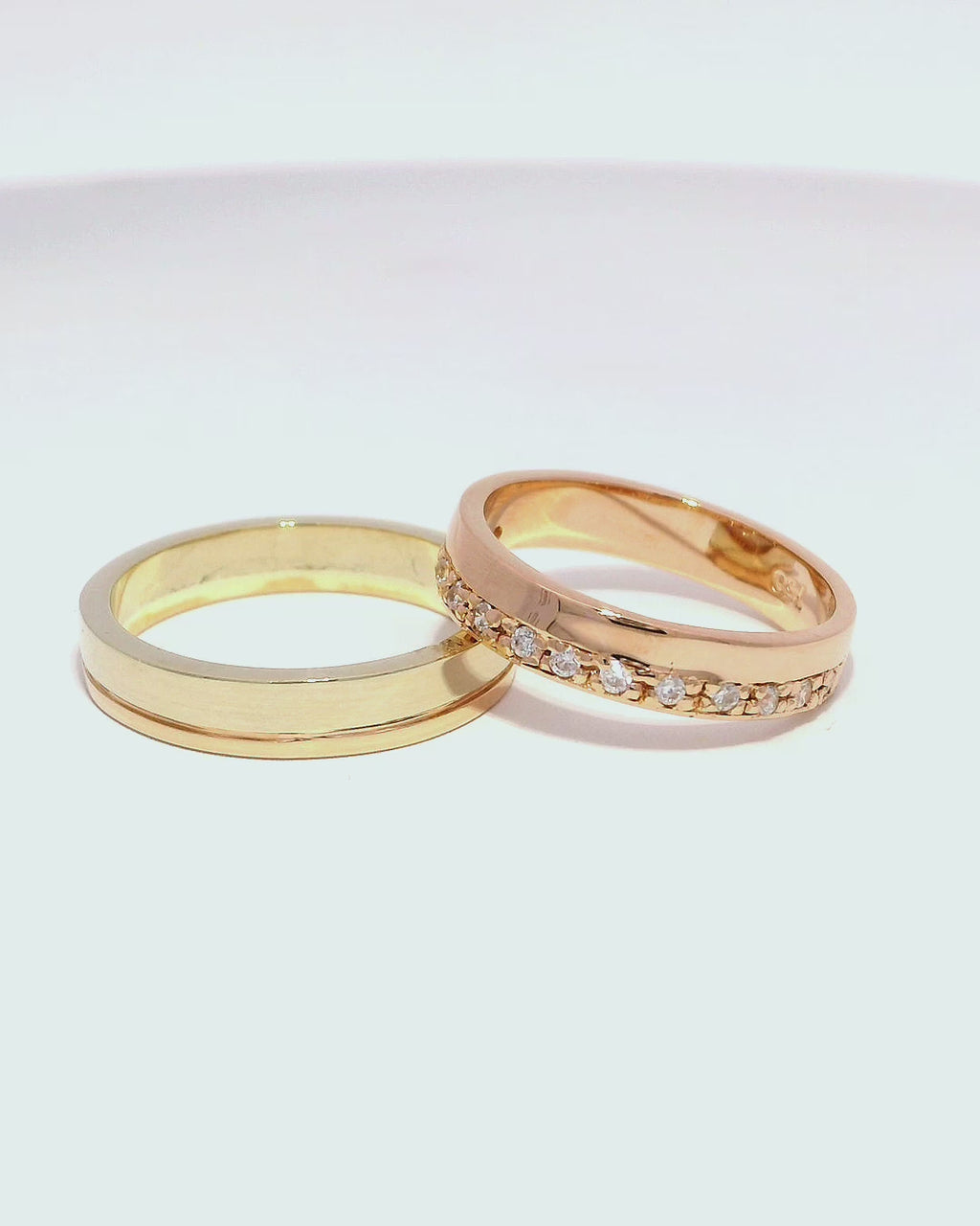 Anillos de oro blanco y rosa 18k con zirconia