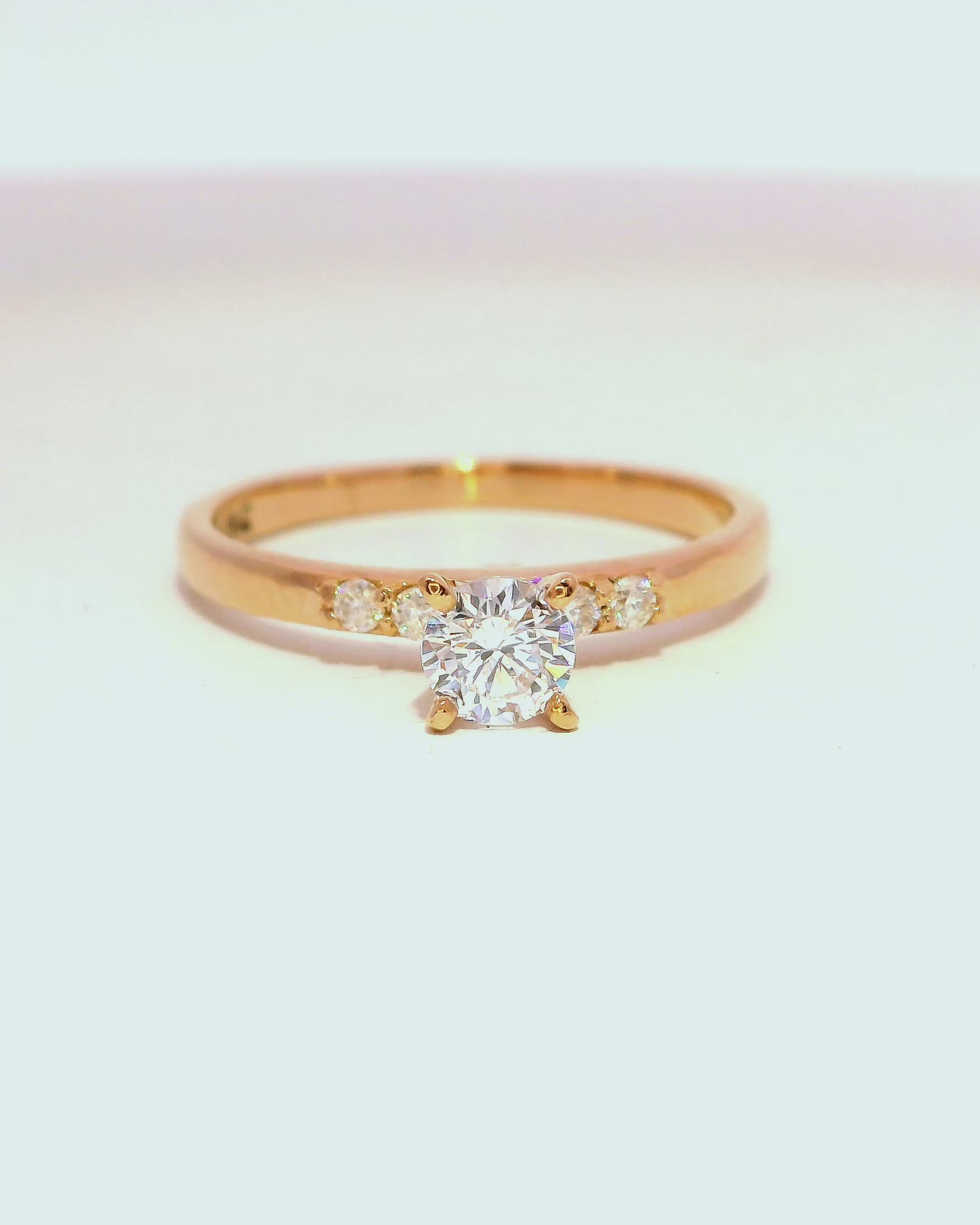 Anillo de compromiso en oro rosa 18k ley con diamante redondo de 0.25 cts
