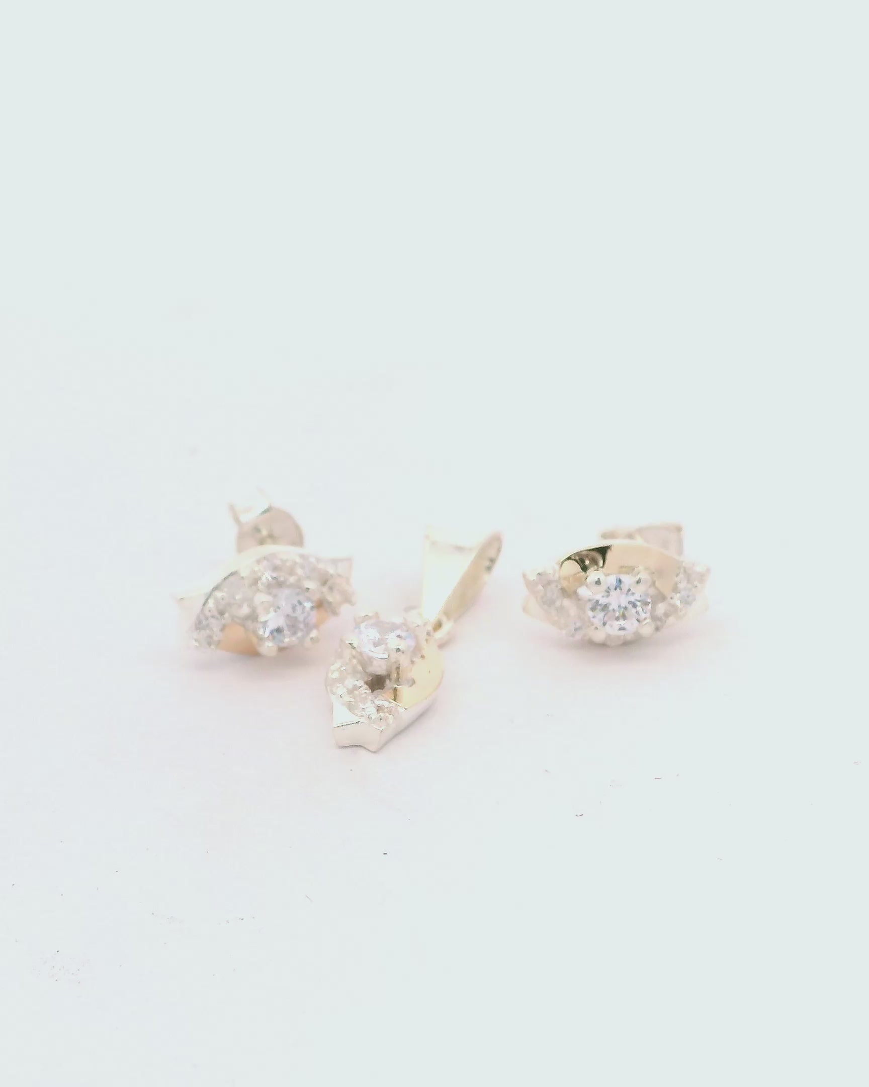 Aretes y dije de plata con oro con zircones blancos